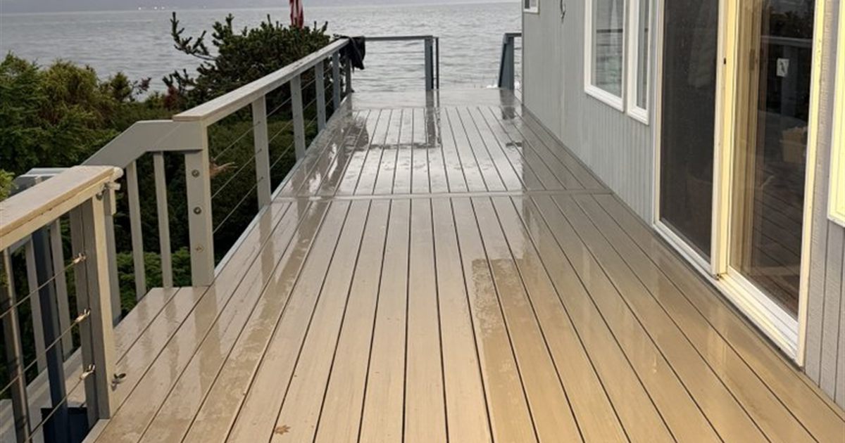 Rain-soaked deck overlooking Puget Sound, the best decking material for Seattle's wet climate has to handle this year-round